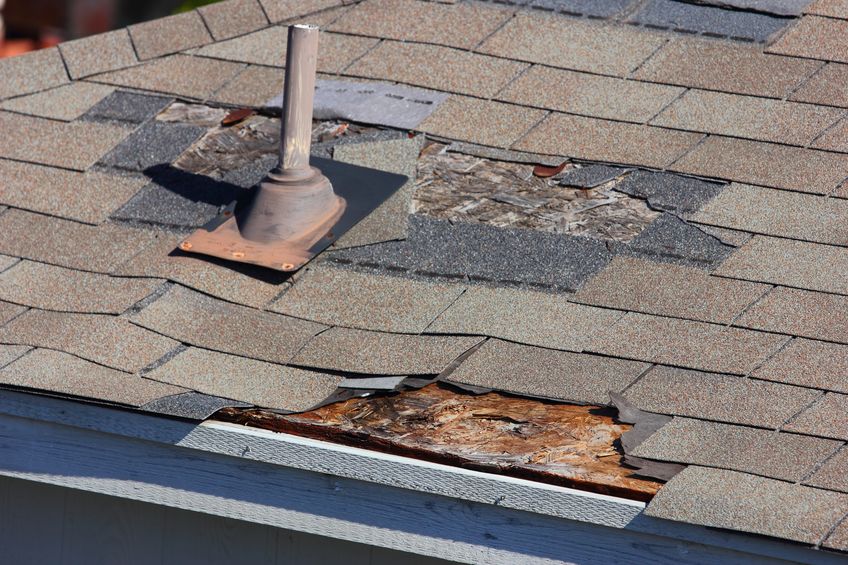 Worn out Shingles on residential roof