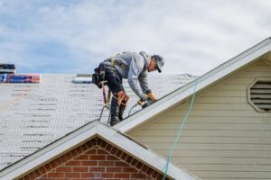 Roofing expert at work